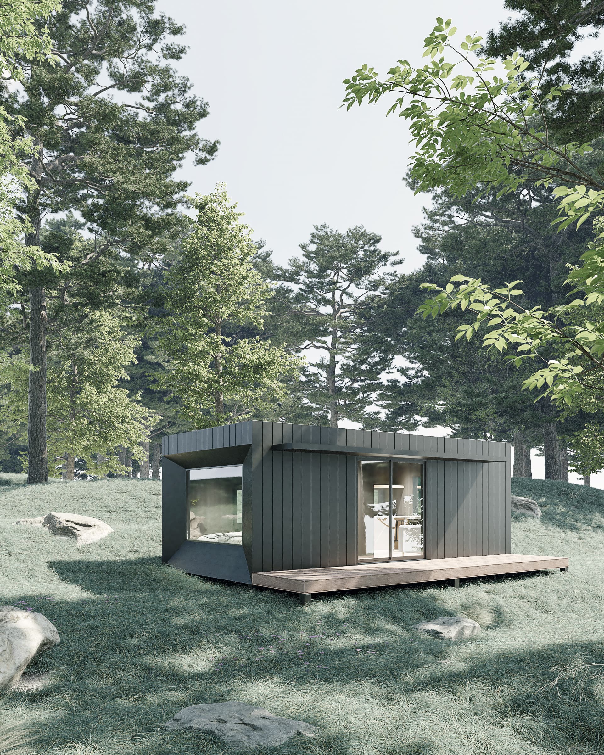 Un studio de jardin Arko posé dans une clairière boisée, empreinte au sol minimale